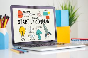 start up company image on laptop screen